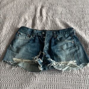 Distressed denim shorts